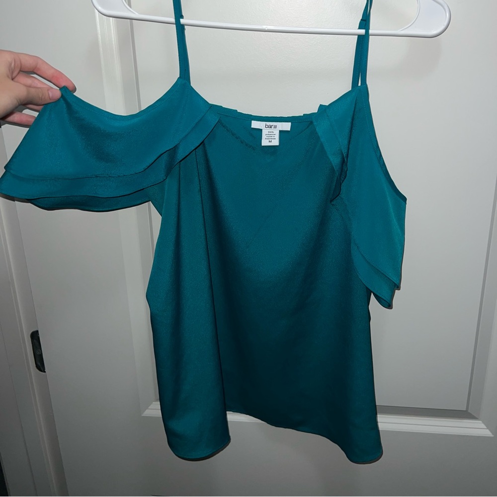 Medium teal shoulder cut out blouse. Worn three times